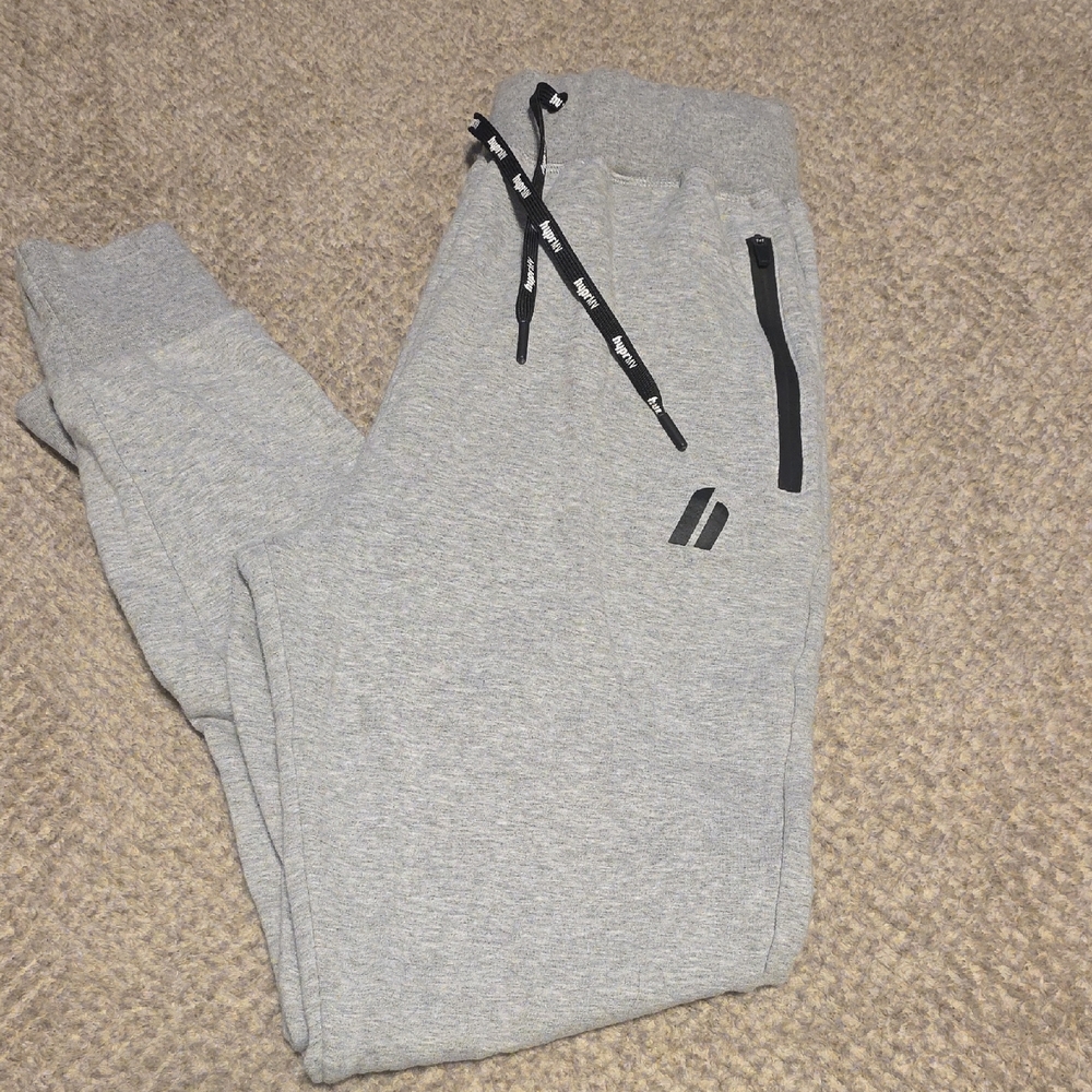 Gray Teen/ Kids Sweatpants with Black Accents. Zip Pockets. Gray. Drawstrings.